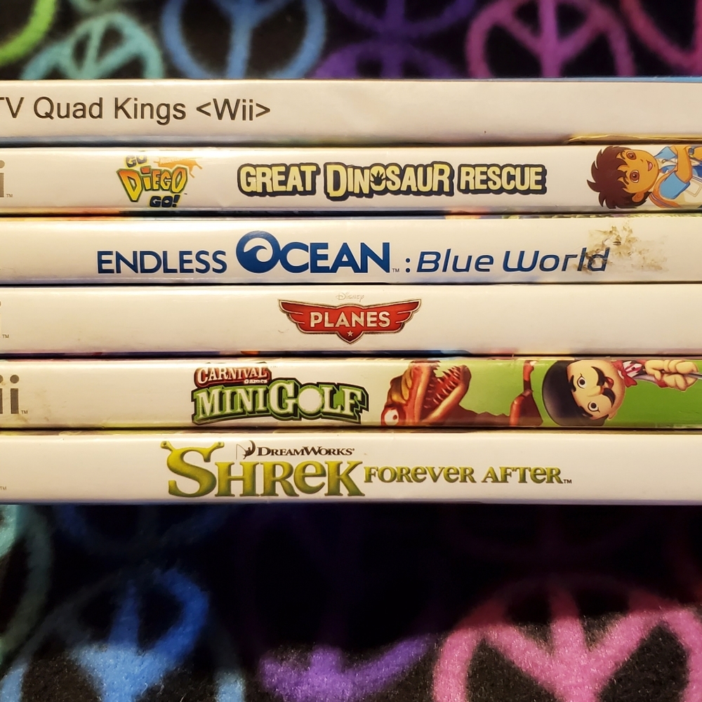 Wii games-Shreck, Endless Ocean, Planes, Quad Kings, Go Diego Go, & CarnivalGolf